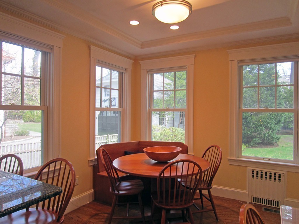 12 Arlington Road Wellesley, MA 02481 - Photo 13 of 26 a view of a dining room with furniture a chandelier and wooden floor