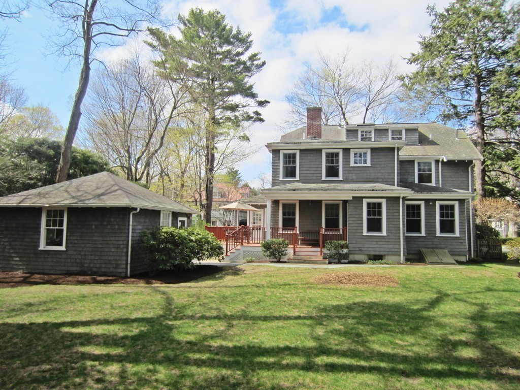 12 Arlington Road Wellesley, MA 02481 - Photo 22 of 26 a front view of a house with garden