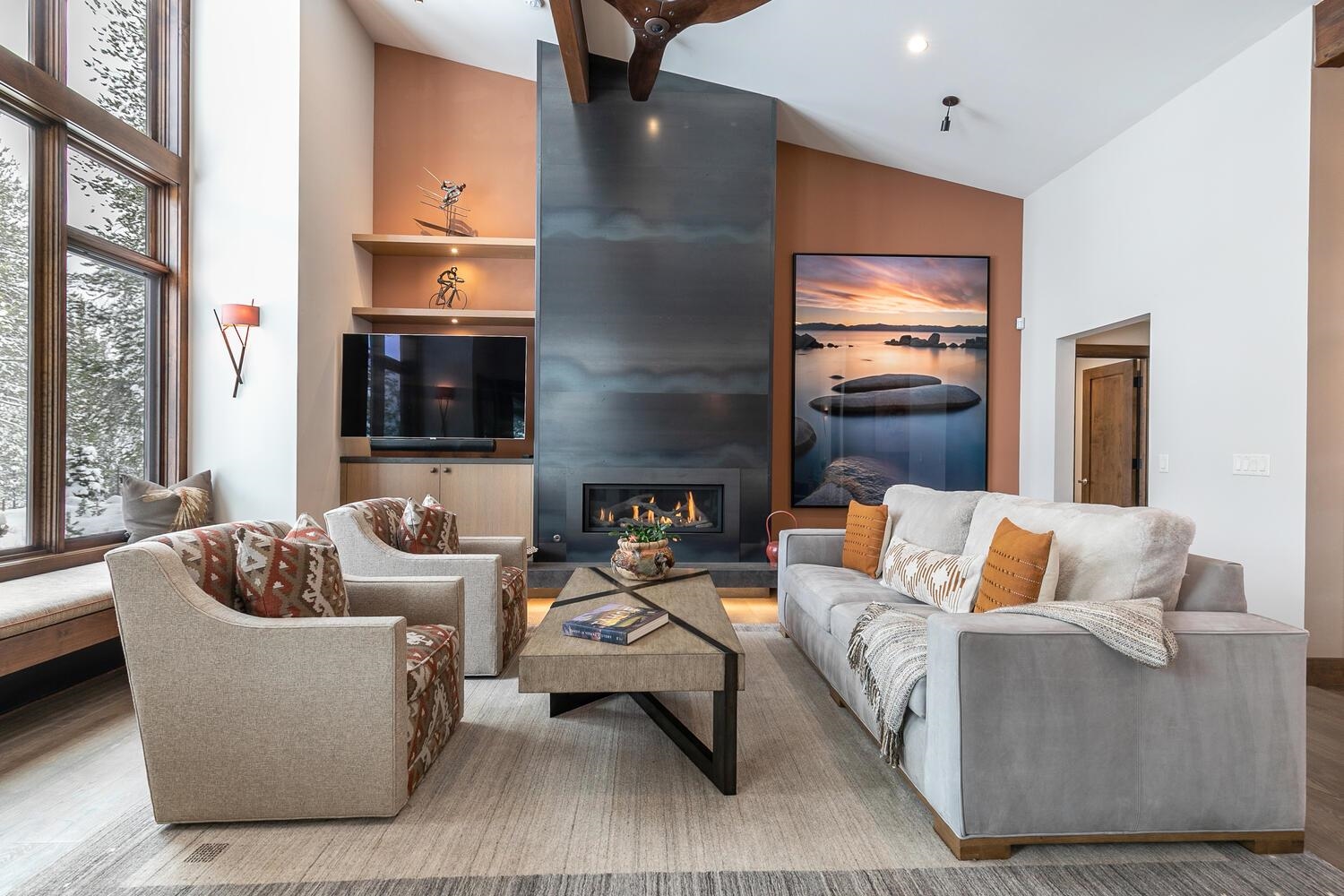 11631 Ghirard Road Truckee, CA 96161 - Photo 2 of 21 a living room with furniture and a fireplace