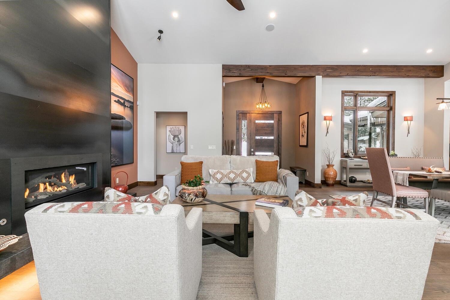 11631 Ghirard Road Truckee, CA 96161 - Photo 3 of 21 a living room with fireplace furniture and a flat screen tv