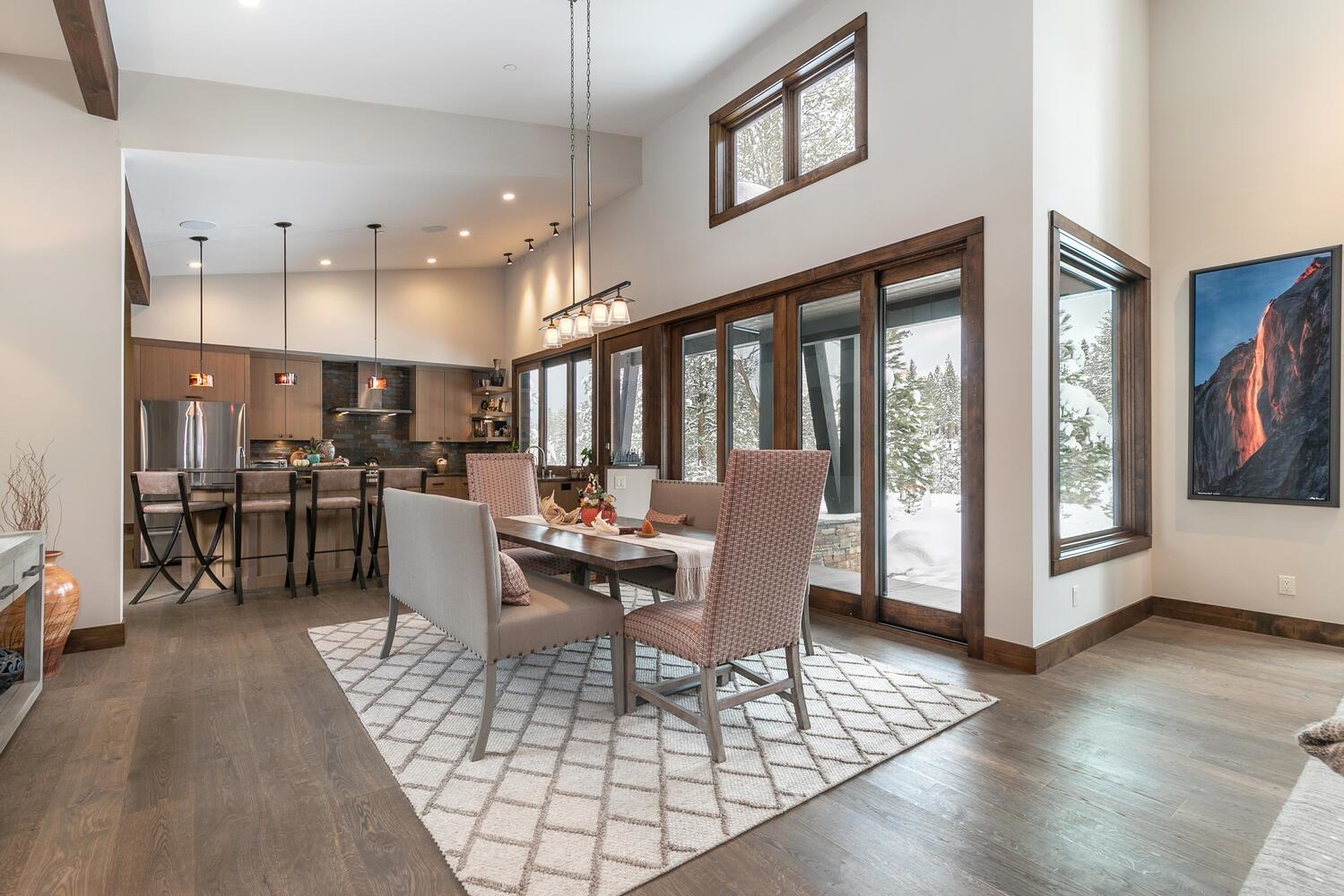 11631 Ghirard Road Truckee, CA 96161 - Photo 5 of 21 a view of a dining room with furniture window and wooden floor