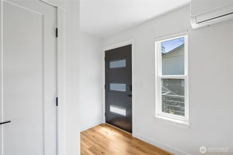 a view of an empty room and window