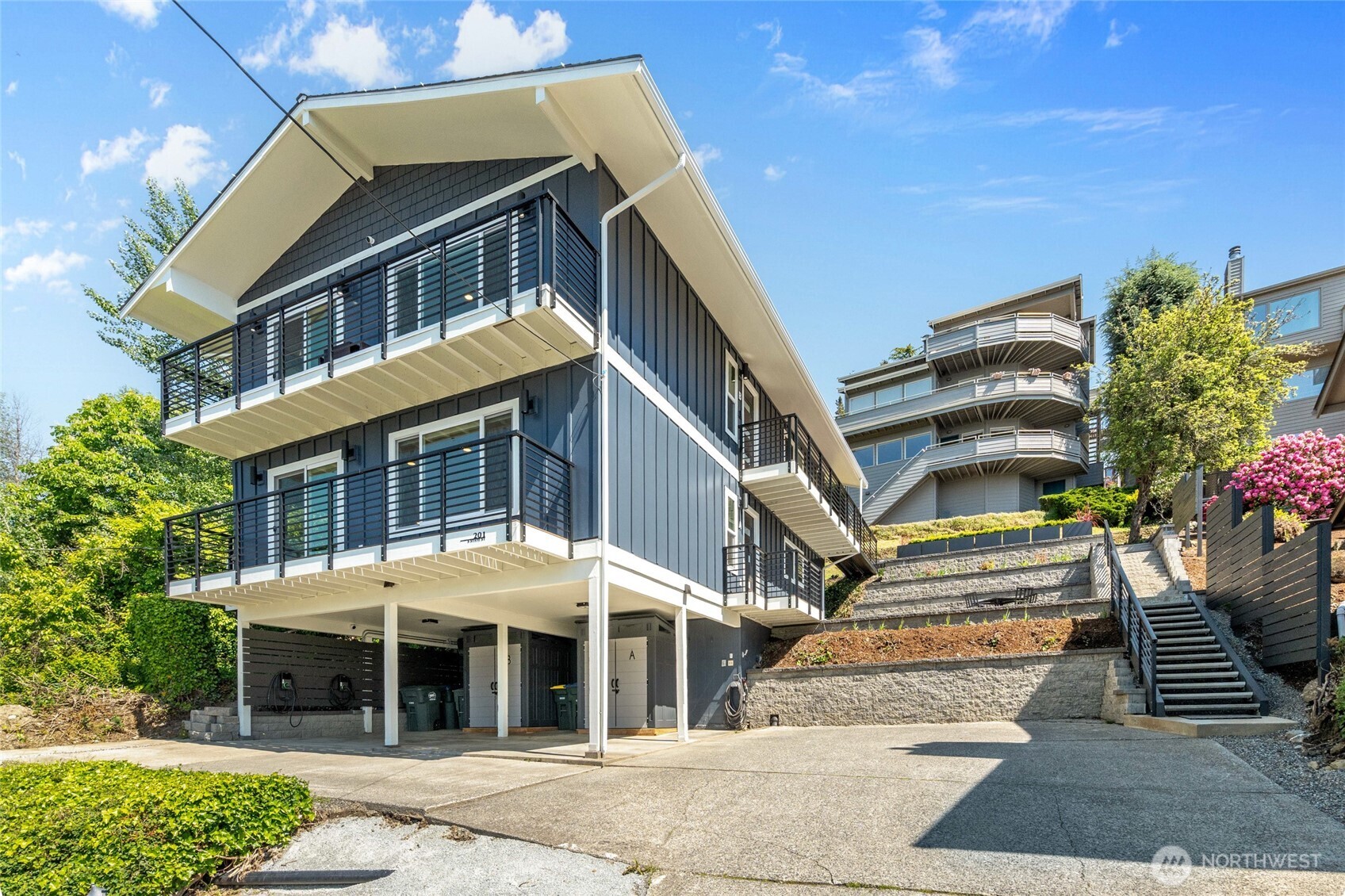 201 South State Street, Unit A Bellingham, WA 98225 - Photo 24 of 35 a front view of a house with a yard