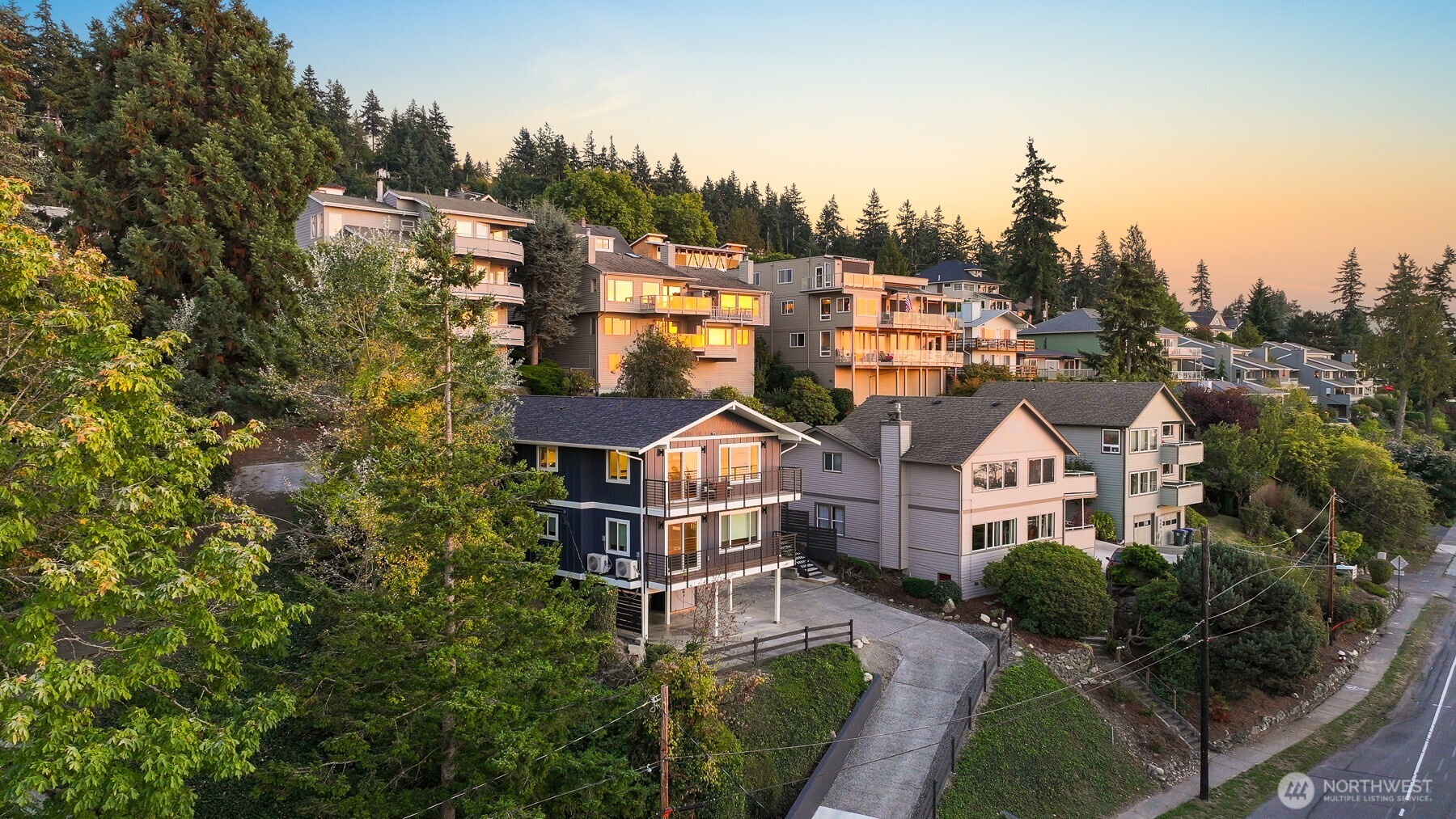 201 South State Street, Unit A Bellingham, WA 98225 - Photo 35 of 35 a view of a big house with a big yard and large tree