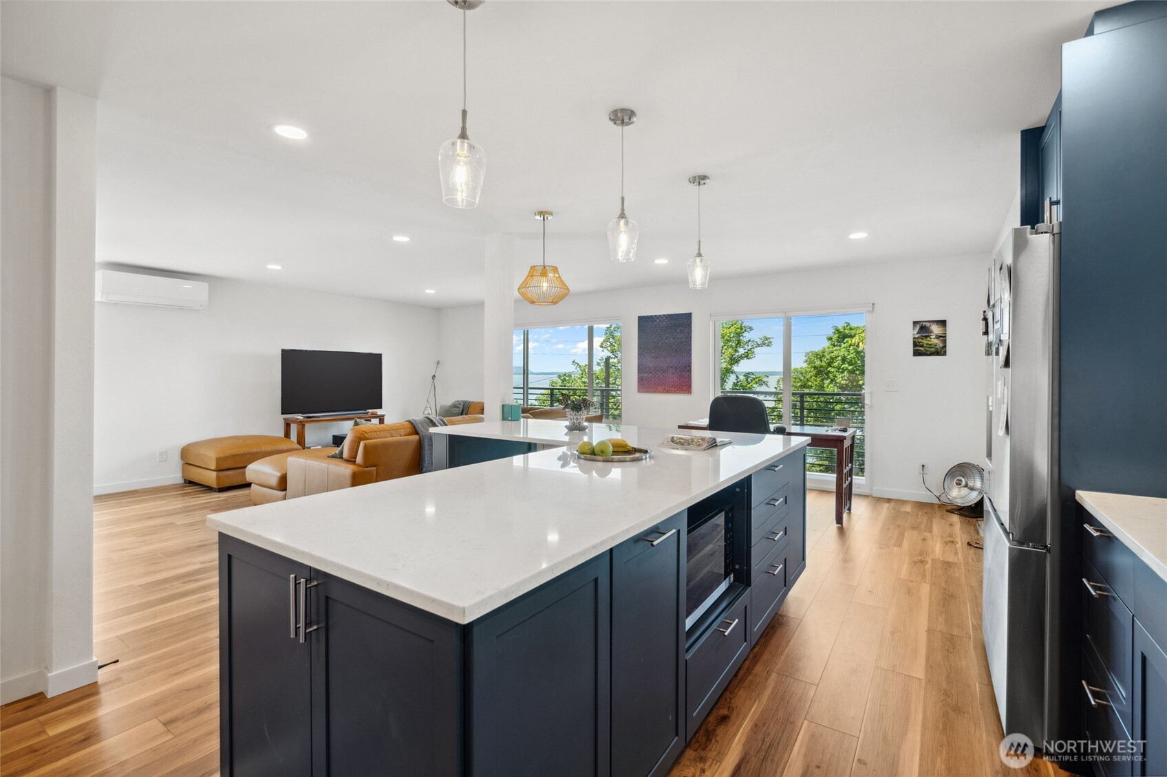 201 South State Street, Unit A Bellingham, WA 98225 - Photo 8 of 35 a kitchen with counter and chairs