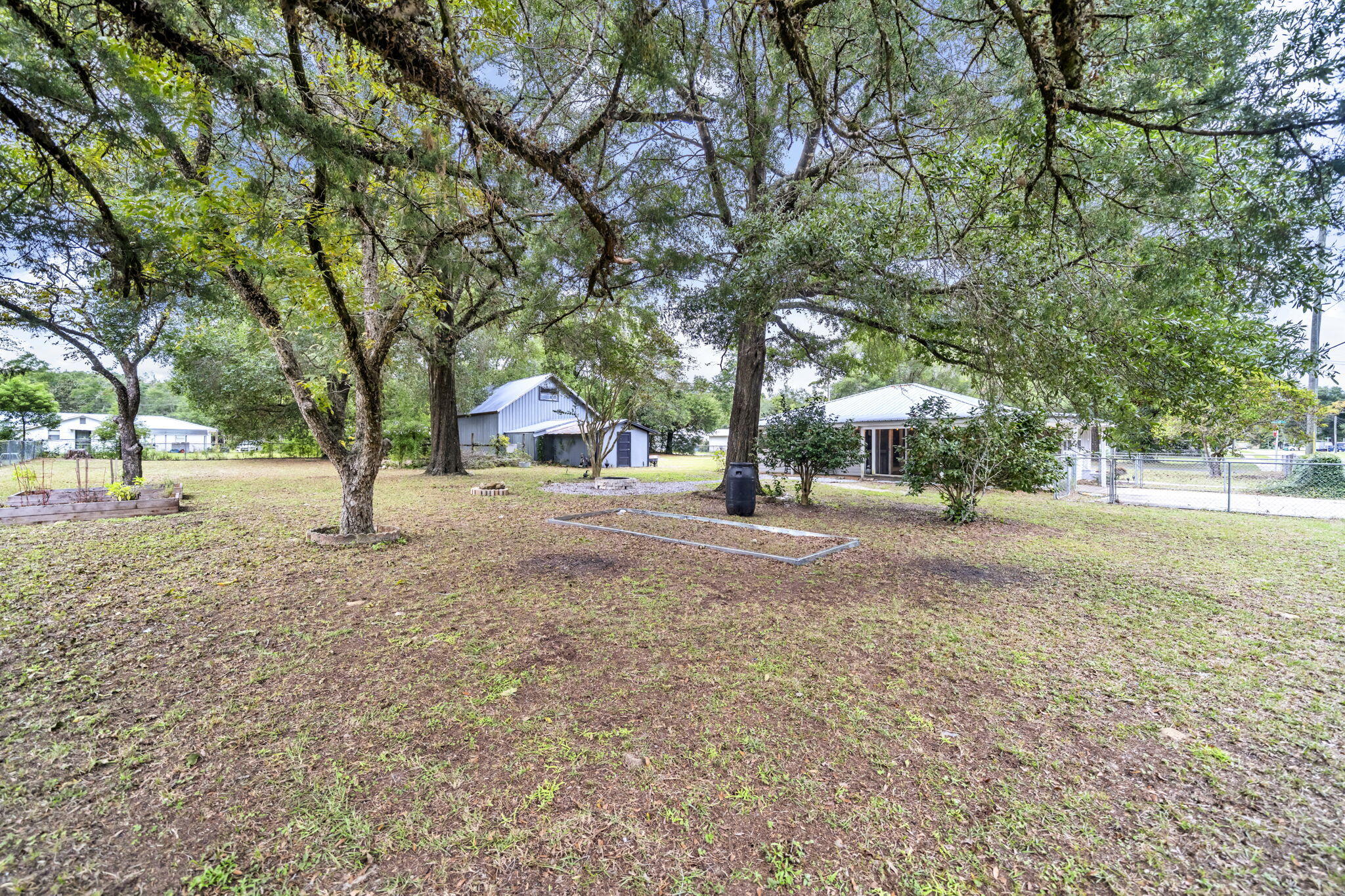 226 South 19th Street DeFuniak Springs, FL 32435 - Photo 17 of 46 a view of road with trees
