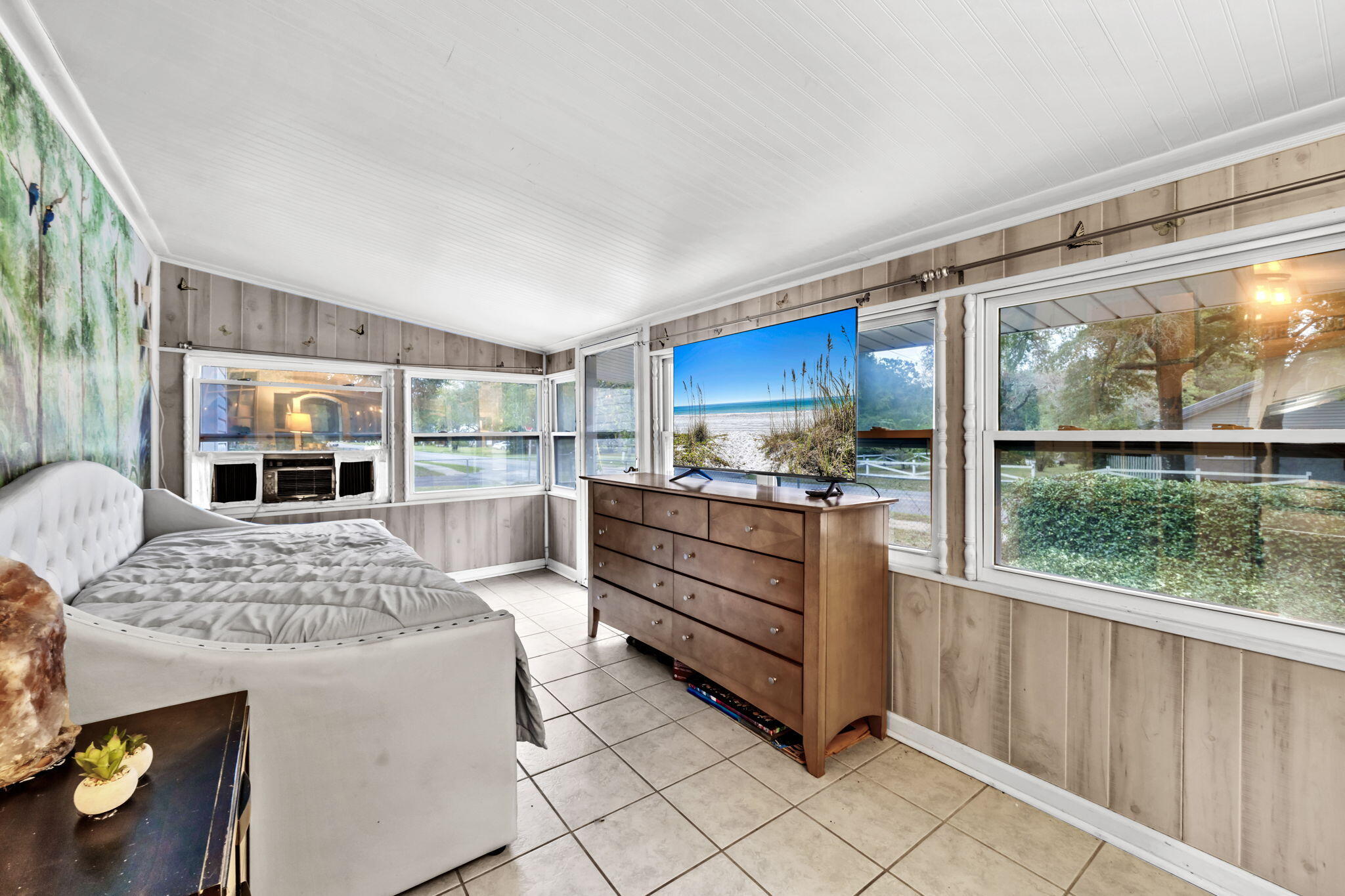 226 South 19th Street DeFuniak Springs, FL 32435 - Photo 26 of 46 a kitchen with stainless steel appliances kitchen island granite countertop a refrigerator and a stove top oven