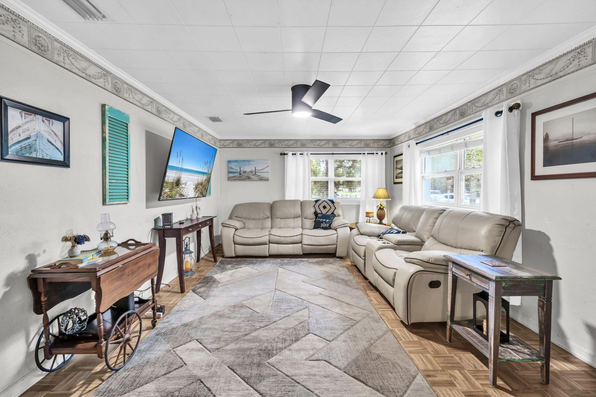 226 South 19th Street DeFuniak Springs, FL 32435 - Photo 32 of 46 a living room with furniture and a flat screen tv