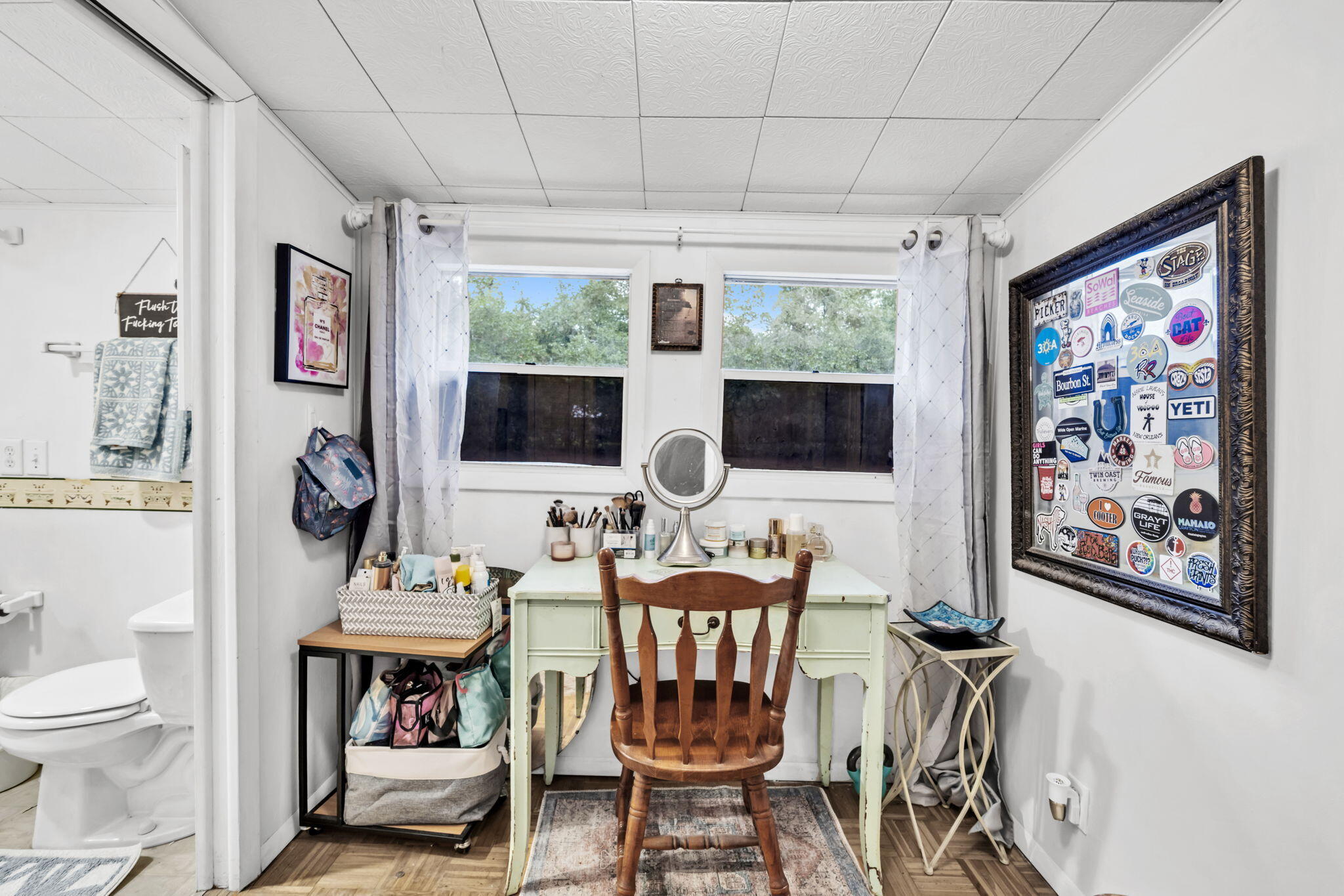 226 South 19th Street DeFuniak Springs, FL 32435 - Photo 40 of 46 a view of a dining room with furniture a flat screen tv and a window