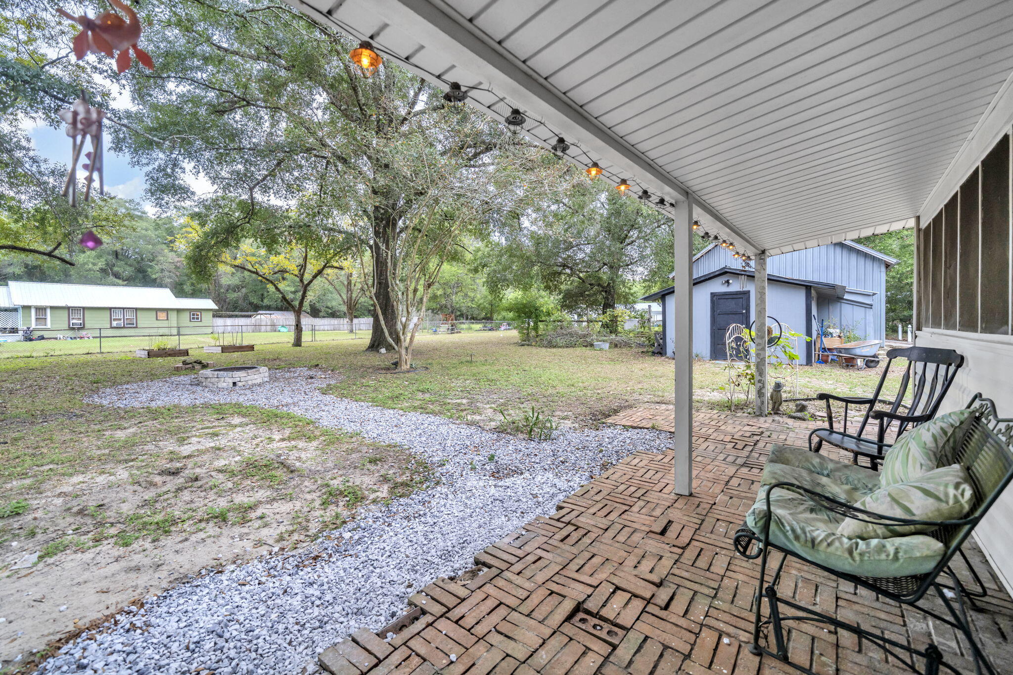 226 South 19th Street DeFuniak Springs, FL 32435 - Photo 8 of 46 a view of a yard with patio