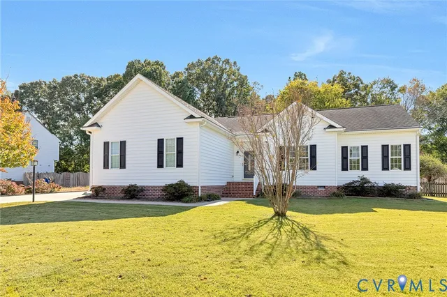 a view of a house with swimming pool and sitting area