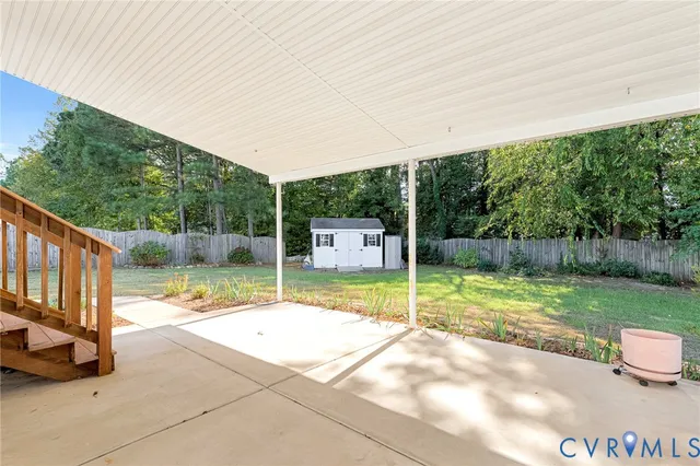 a view of backyard with green space