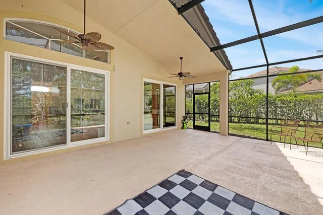 a view of an empty room with a large window