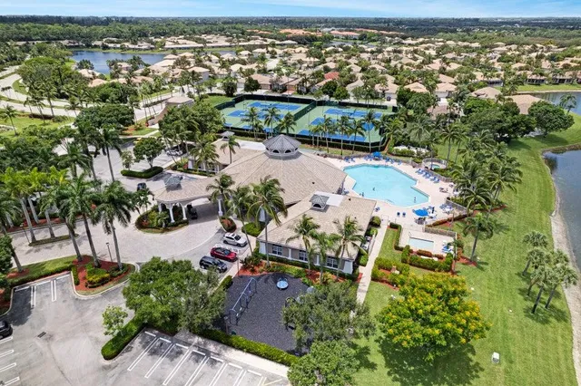 an aerial view of residential house with outdoor space