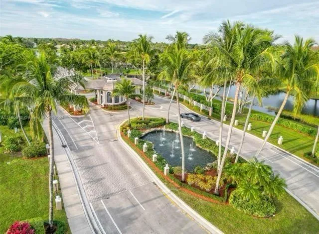 a view of swimming pool from a balcony