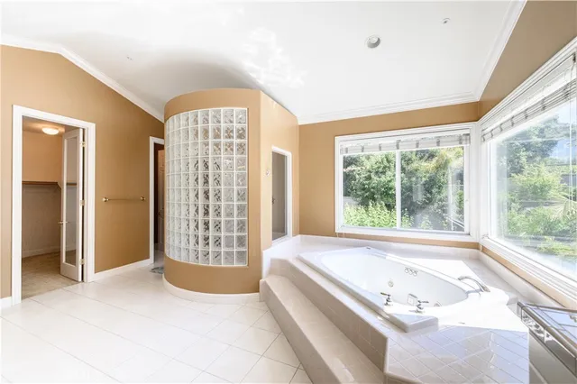 a view of a patio with table and chairs