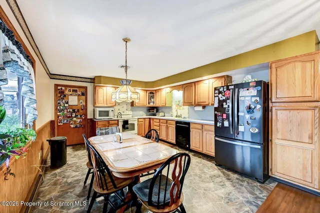 a view of room with a ceiling fan