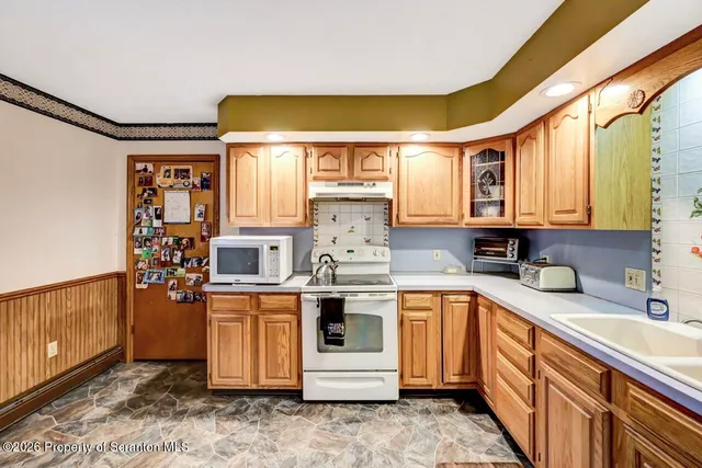 a room with furniture and a book shelf