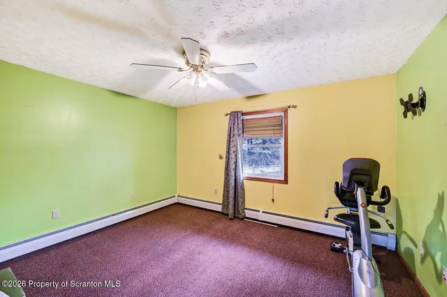 a kitchen with stainless steel appliances granite countertop a refrigerator a sink and wooden cabinets