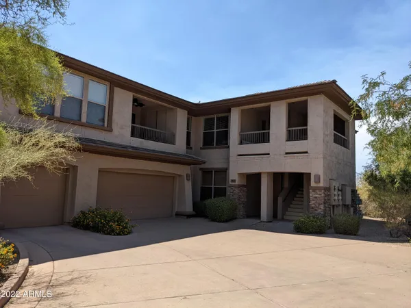 a front view of a house with yard