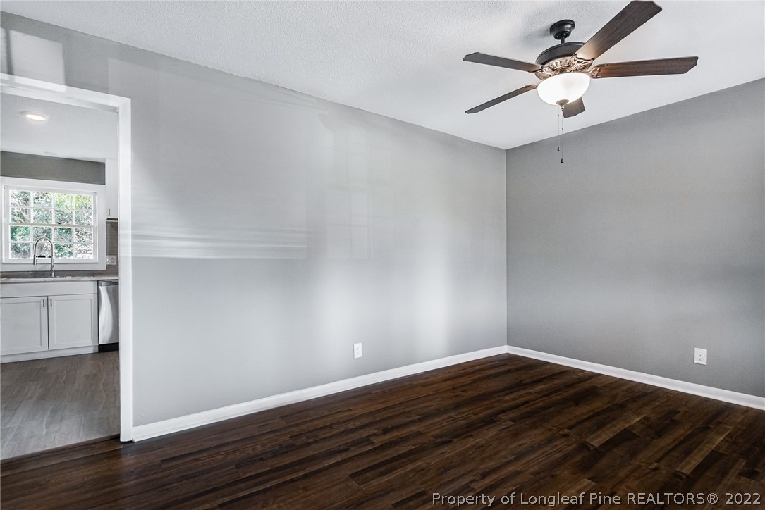 467 North Platte Road Fayetteville, NC 28303 - Photo 11 of 50 a view of an empty room with wooden floor and a window