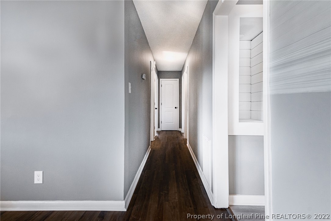 467 North Platte Road Fayetteville, NC 28303 - Photo 19 of 50 a view of a hallway with wooden floor