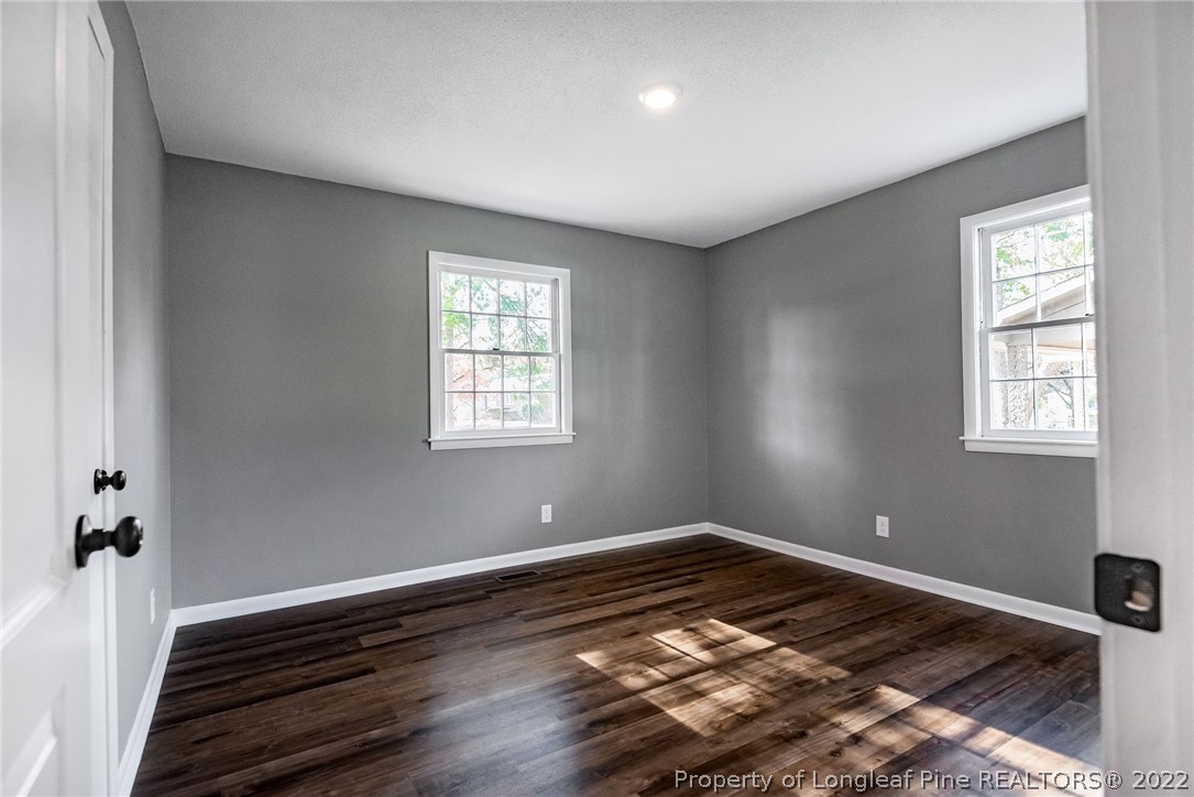 467 North Platte Road Fayetteville, NC 28303 - Photo 25 of 50 a view of room with wooden floor and window