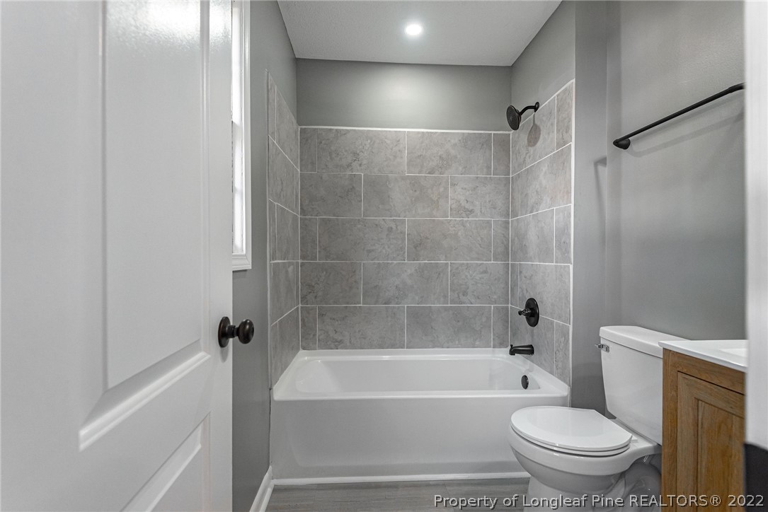 467 North Platte Road Fayetteville, NC 28303 - Photo 30 of 50 a bathroom with a toilet and a bath tub