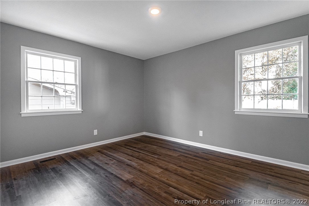 467 North Platte Road Fayetteville, NC 28303 - Photo 35 of 50 a view of room with window and wooden floor