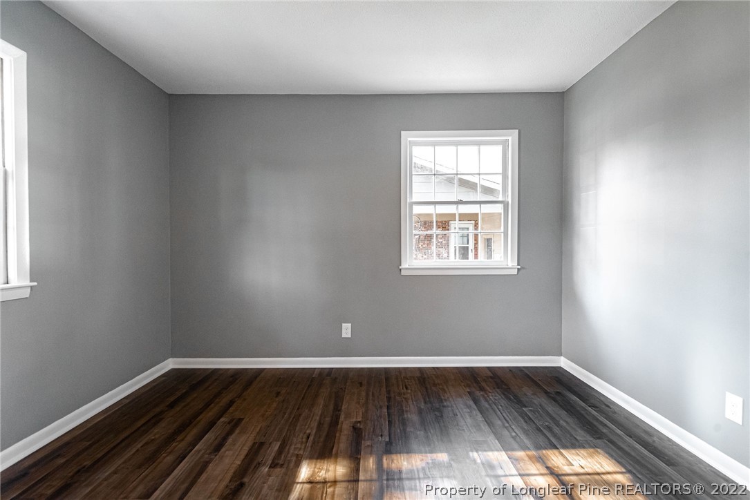 467 North Platte Road Fayetteville, NC 28303 - Photo 36 of 50 a view of an empty room with wooden floor and a window