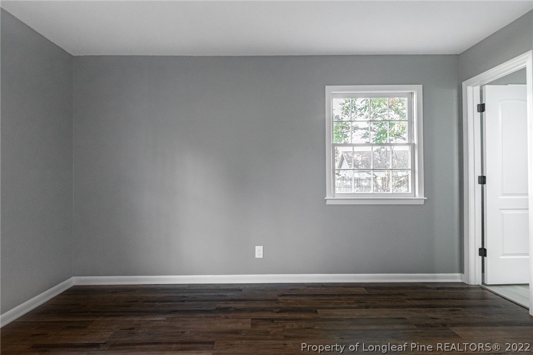 467 North Platte Road Fayetteville, NC 28303 - Photo 39 of 50 a view of an empty room with wooden floor and a window