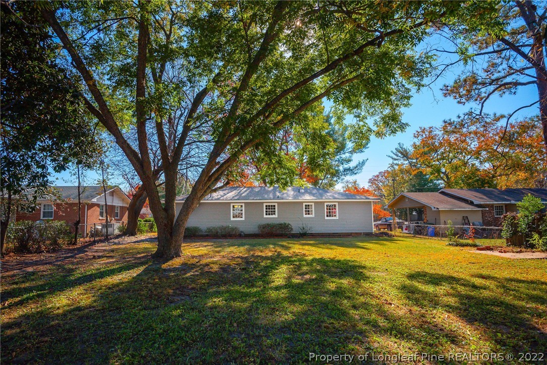 467 North Platte Road Fayetteville, NC 28303 - Photo 45 of 50 a view of a house with a big yard and large trees