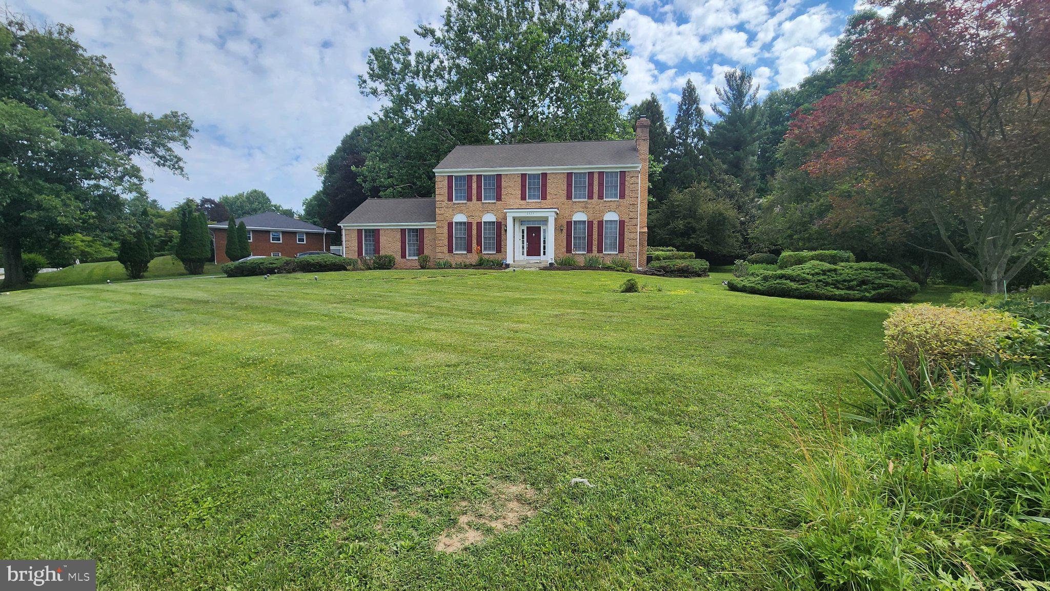 2625 McKenzie Road Ellicott City, MD 21042 - Photo 6 of 35 Charming brick home on lush grounds.