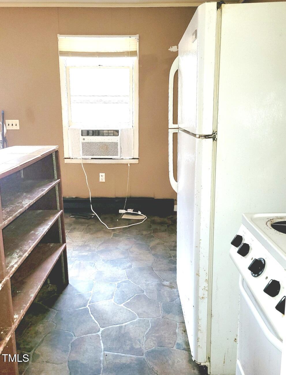 325 Ranch Farm Road, Unit A B Raleigh, NC 27603 - Photo 29 of 36 a view of kitchen with utility and a window