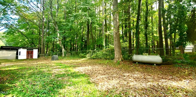 a view of a backyard with garden
