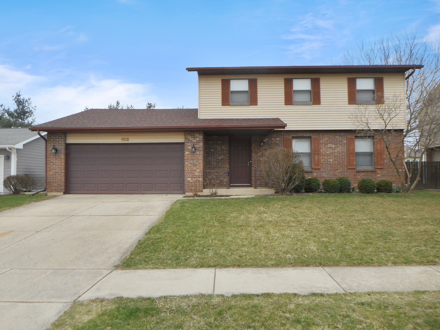532 Shenandoah Trail Elgin, IL 60123 - Photo 1 of 20 a front view of a house with a yard