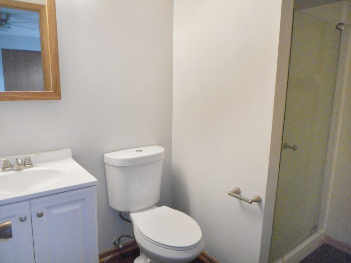 532 Shenandoah Trail Elgin, IL 60123 - Photo 16 of 20 a white toilet sitting next to a bathroom sink