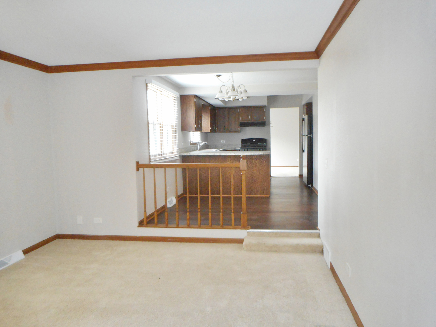 532 Shenandoah Trail Elgin, IL 60123 - Photo 3 of 20 a view of kitchen with kitchen island microwave and stove