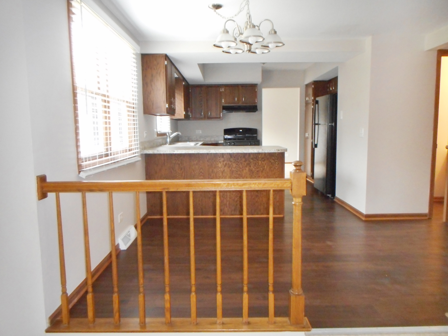 532 Shenandoah Trail Elgin, IL 60123 - Photo 4 of 20 a view of kitchen with granite countertop window and a fireplace
