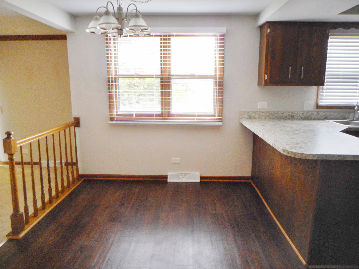 532 Shenandoah Trail Elgin, IL 60123 - Photo 5 of 20 a view of a kitchen with wooden floor and a window