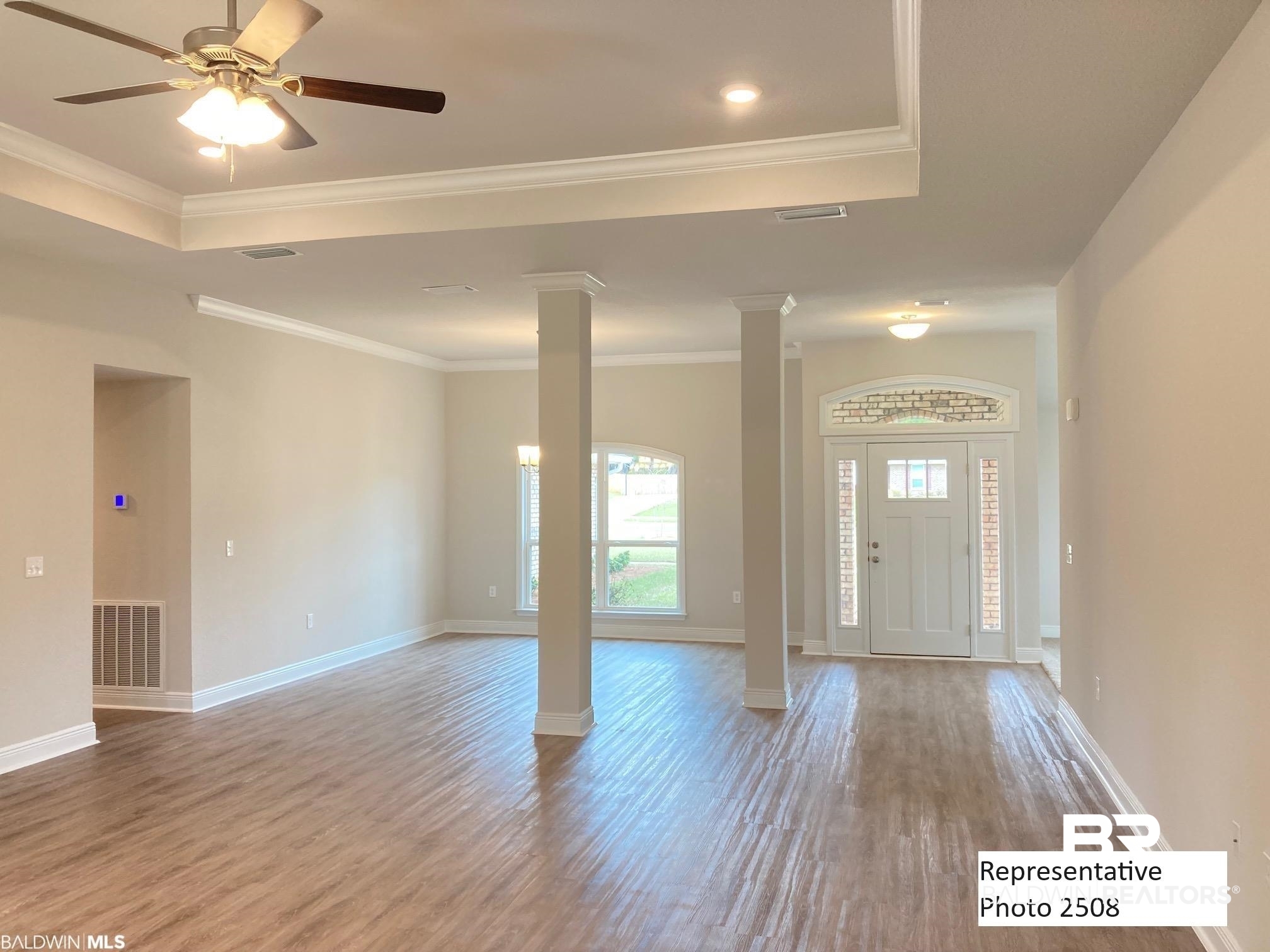 2201 Pollard Road Daphne, AL 36526 - Photo 2 of 15 Foyer featuring ceiling fan, hardwood / wood-style flooring, and crown molding