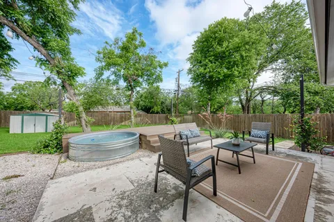a garden view with a seating space