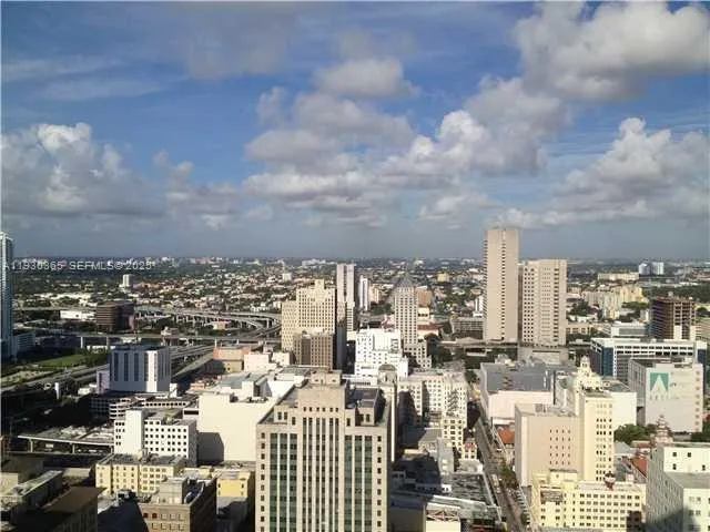 a view of city with ocean view