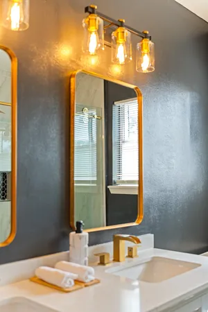 a bathroom with a tub and a sink