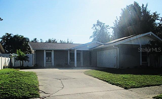 12932 81st Avenue Seminole, FL 33776 - Photo 27 of 27 a view of a house with a yard