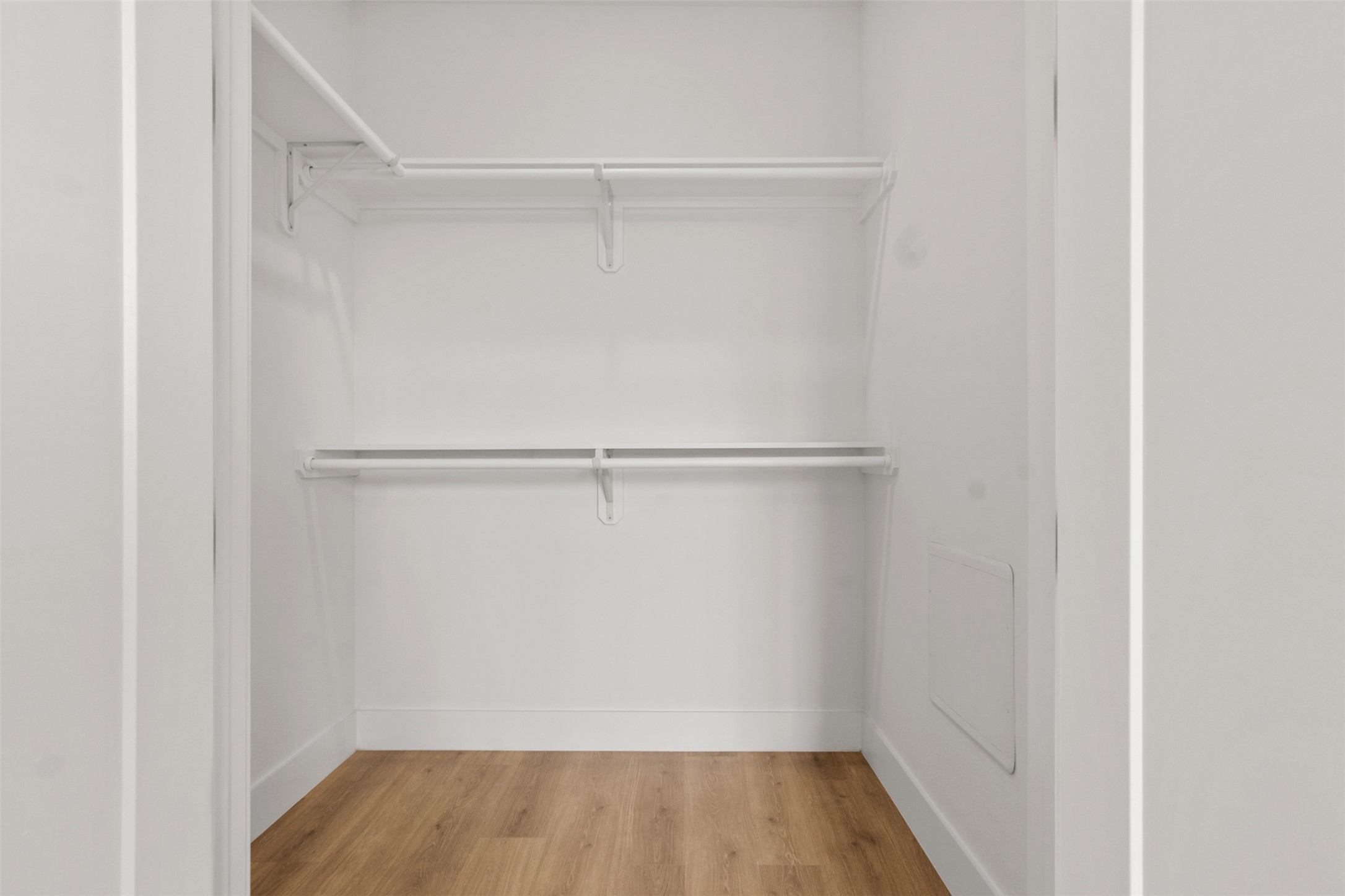 1701 Simond Avenue, Unit 418 Austin, TX 78723 - Photo 21 of 37 Walk in closet with wood finished floors.