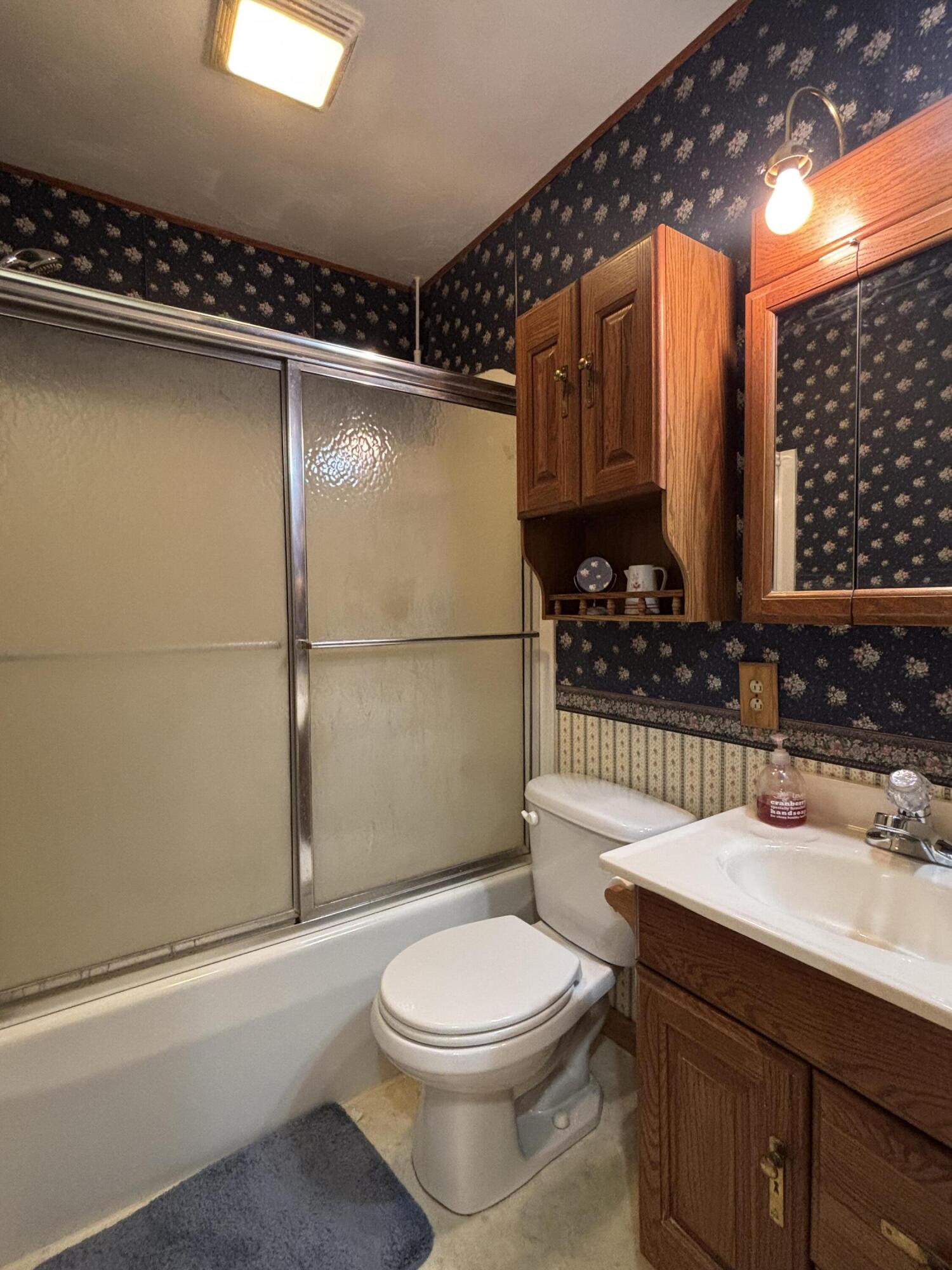 870 Bunkum Road Rensselaer, IN 47978 - Photo 18 of 33 a bathroom with a sink a toilet and shower