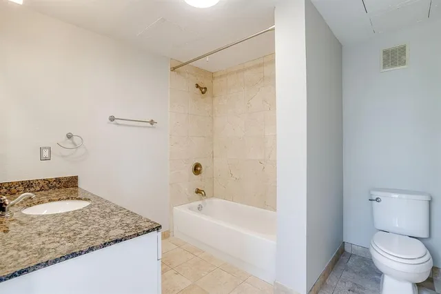 a view of a utility room with washer and dryer