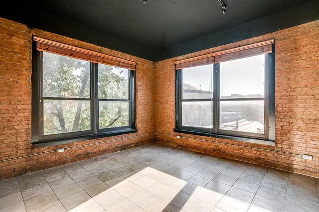 a view of a building with a tree