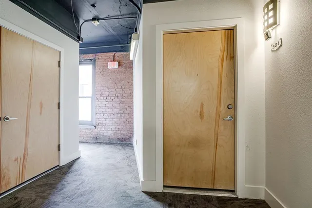 a view of a bathroom with a glass door